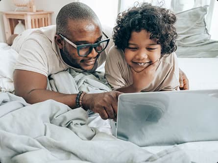 Parent and child on computer